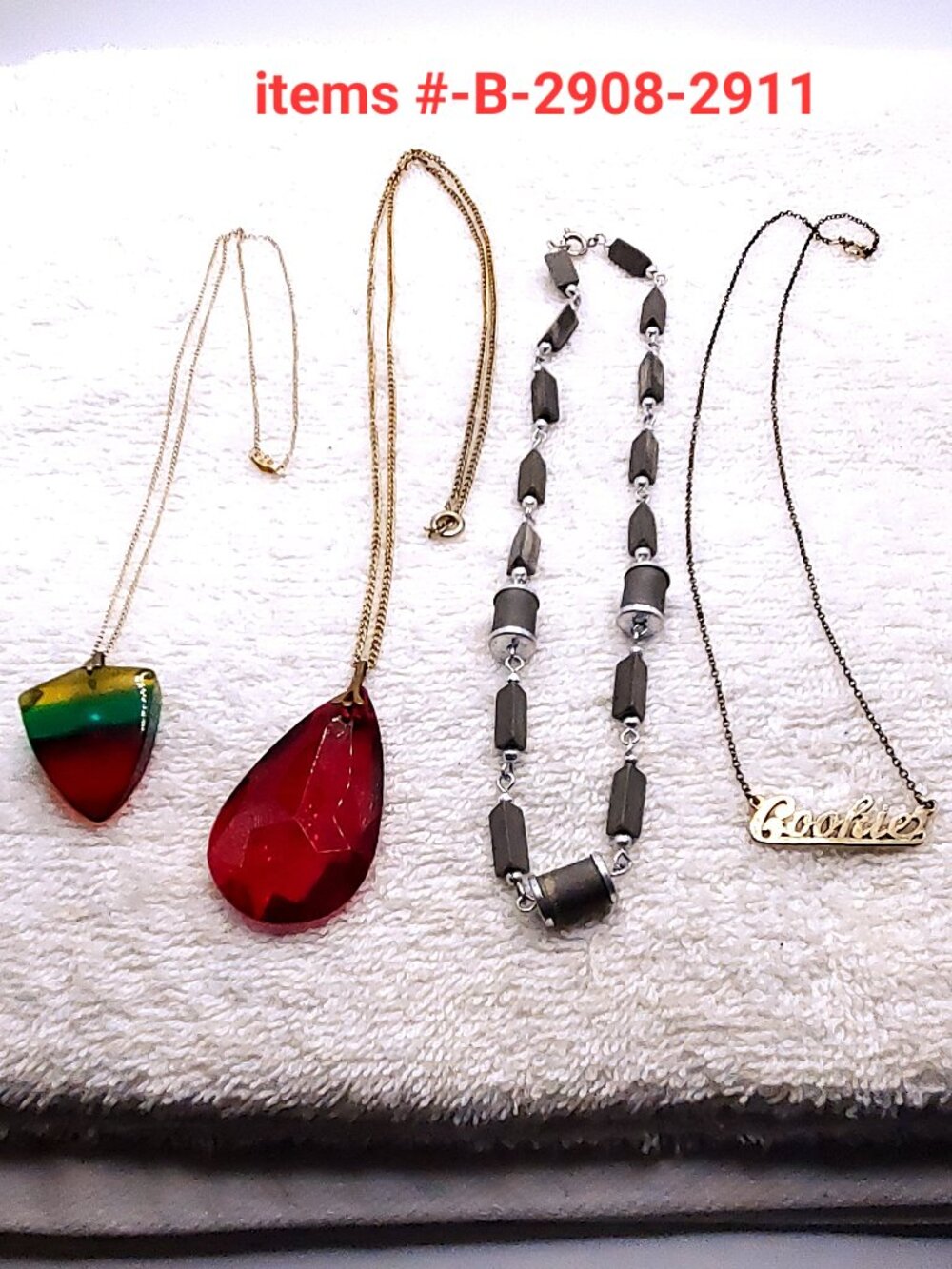 4 Vintage necklaces, items # B-2908-2911,. wt. 31 grams.